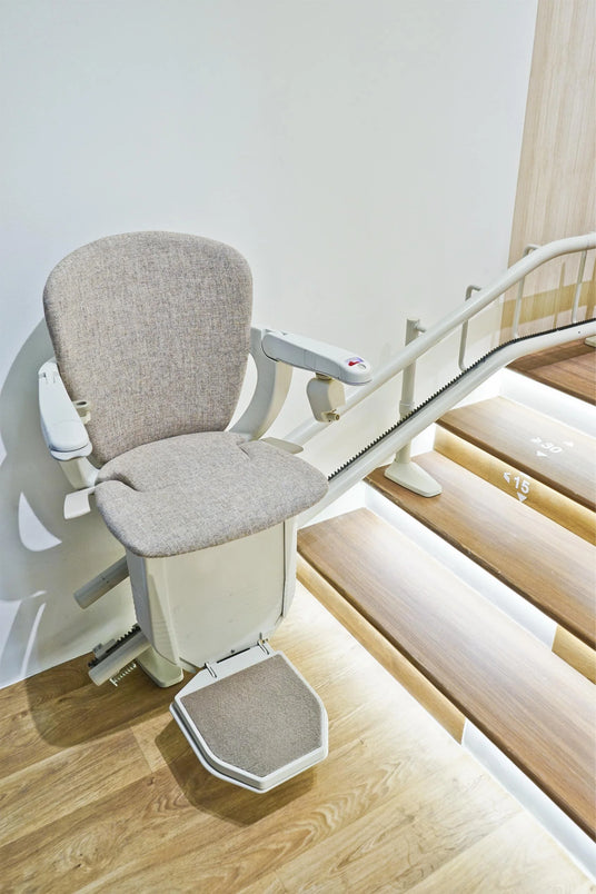 Person using a perching stairlift