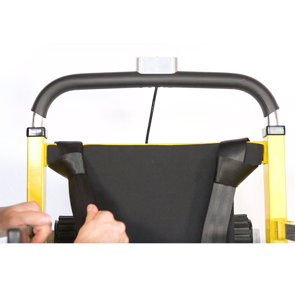 Rear straps of the 4-Point Harness attached to the upper frame of the Mobile Stairlift for extra stability