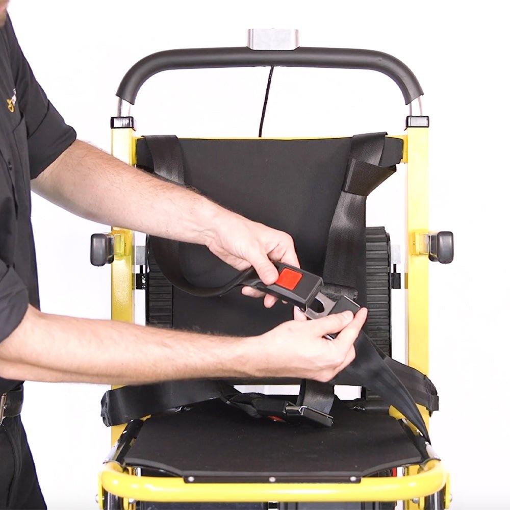 4-Point Harness fully installed on Mobile Stairlift seat with rider being securely buckled in